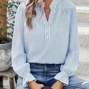 NWOT. Blue and White Striped Women's Top
Size L